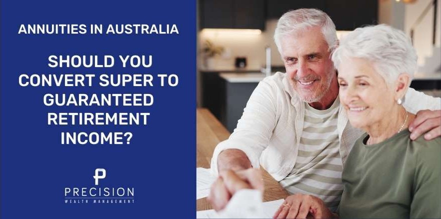 Happy Australian couple reviewing retirement annuity options and superannuation conversion strategy for guaranteed income